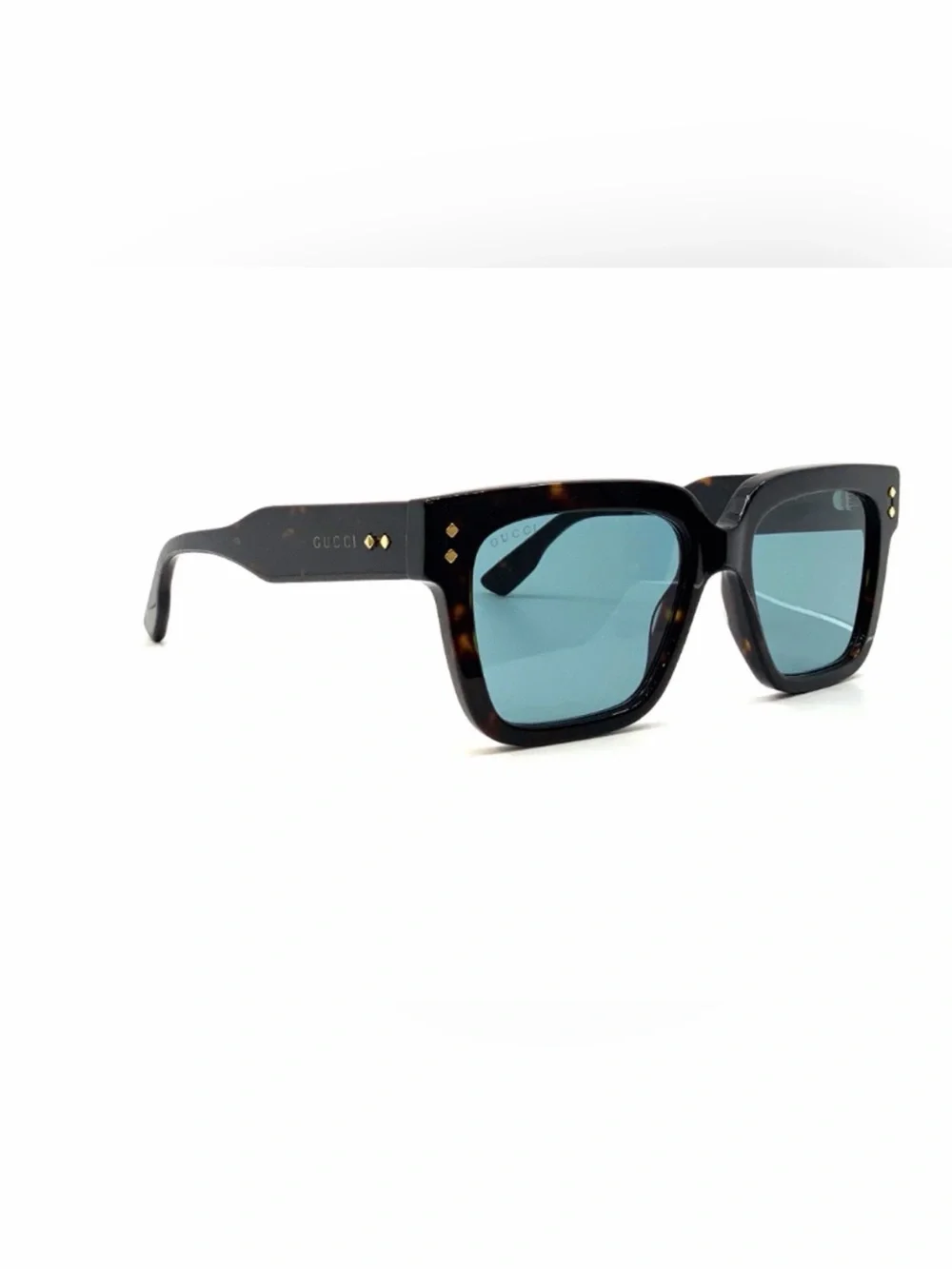Gucci Sunglasses with dark Havana frame and blue lenses